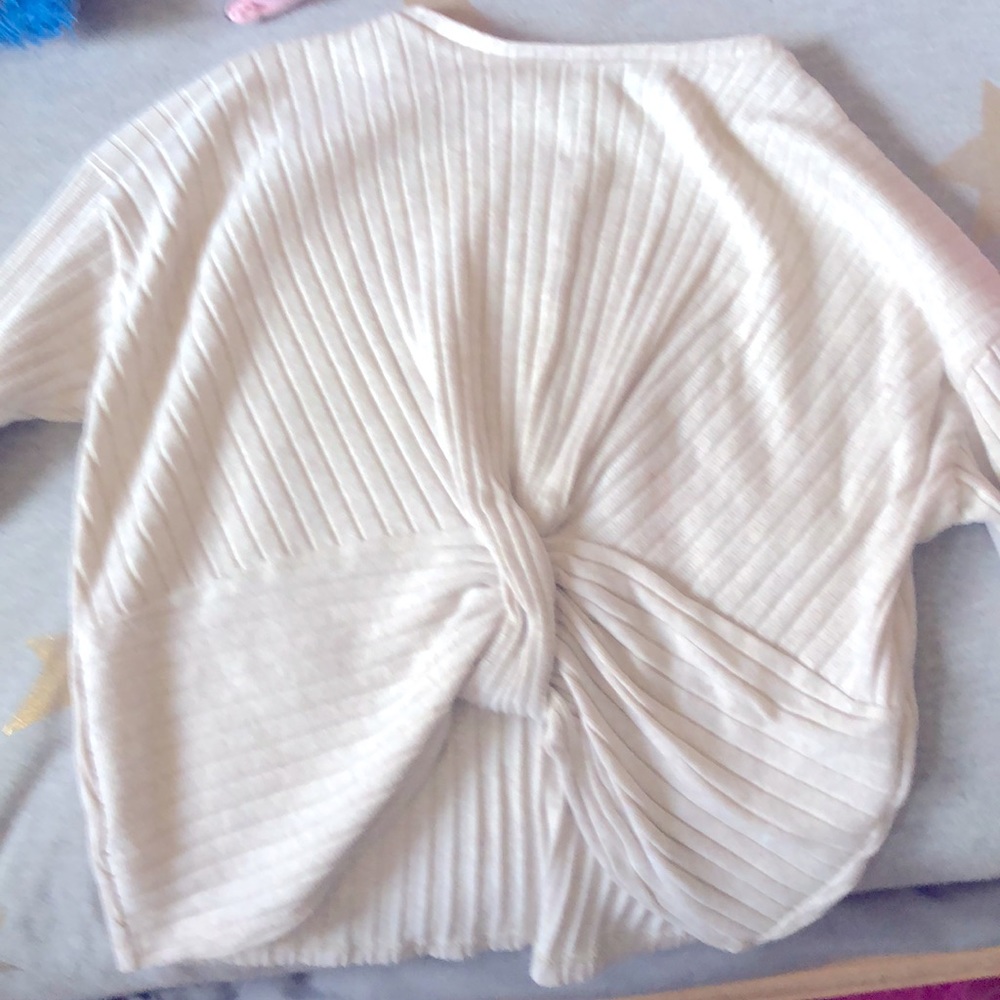 A tanish sweater super cute